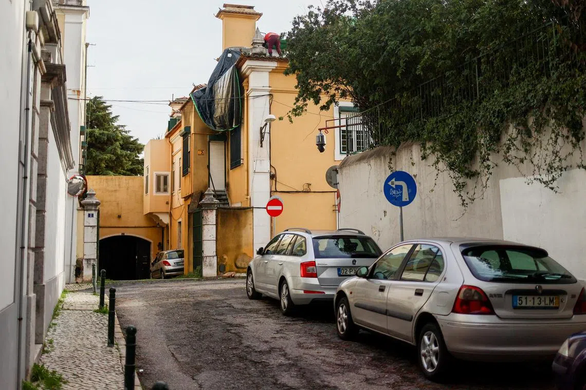 Three large 360-degree surveillance cameras were installed at China's embassy building in Lisbon.