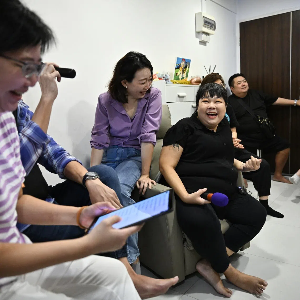 Friends singing during the Living Funerals: A Celebration of Life event for Ms Carolyn Too. 