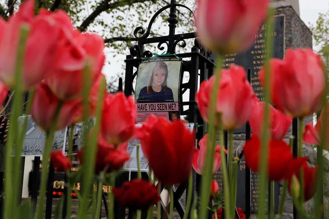 FILE PHOTO: An age progression image of Madeleine McCann hangs on a war memorial on the 11th anniversary of her disappearance from a holiday flat in Portugal, near her home in Rothley, Britain May 3, 2018.  REUTERS/Darren Staples/File Photo