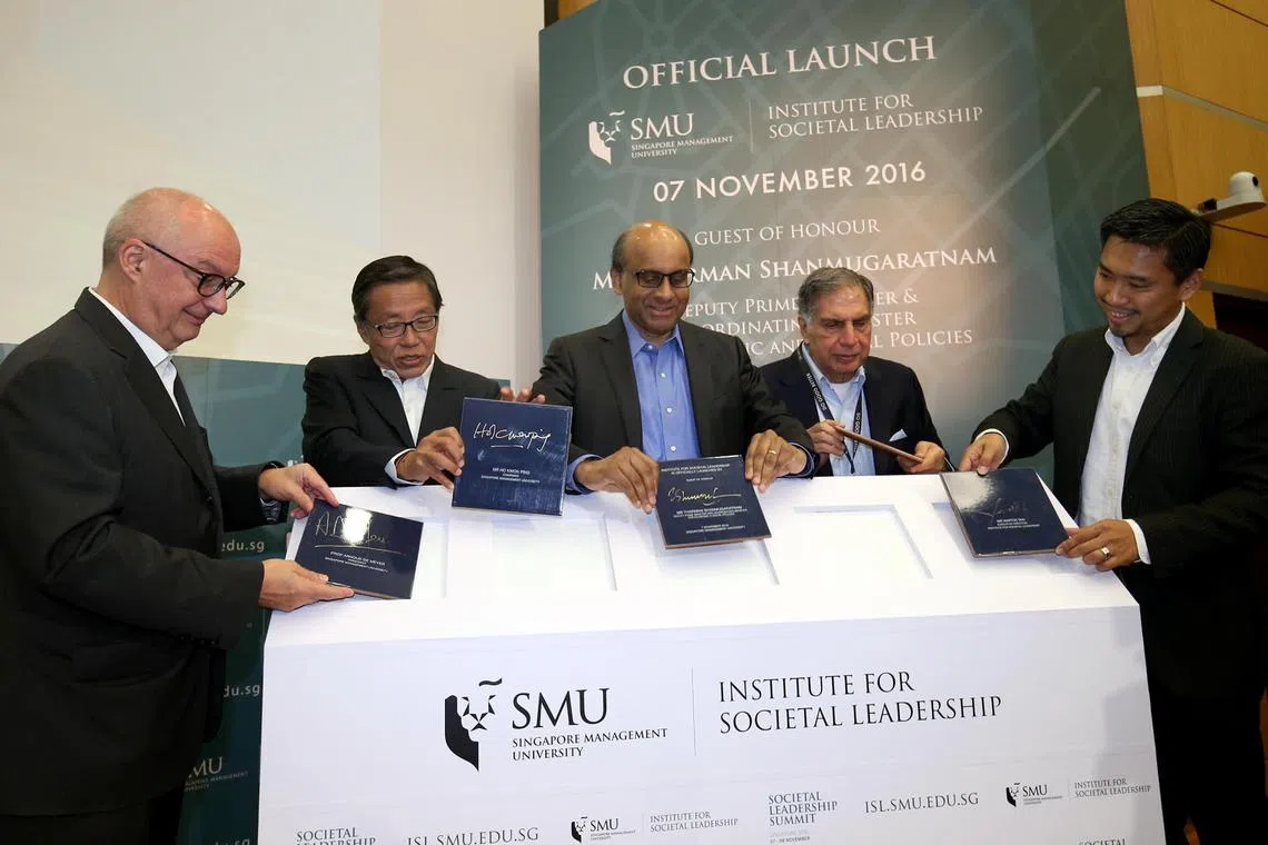 Mr Ratan Tata (second from right) is seen here at the official launch of the Singapore Management University (SMU) Institute for Societal Leadership (ISL) on Nov 7, 2016. Also in the picture are (from left) then-SMU President Profesor Arnoud De Meyer; then-SMU chairman Ho Kwon Ping; then-Deputy Prime Minister and current President Tharman Shanmugaratnam; and former ISL executive director Martin Tan.