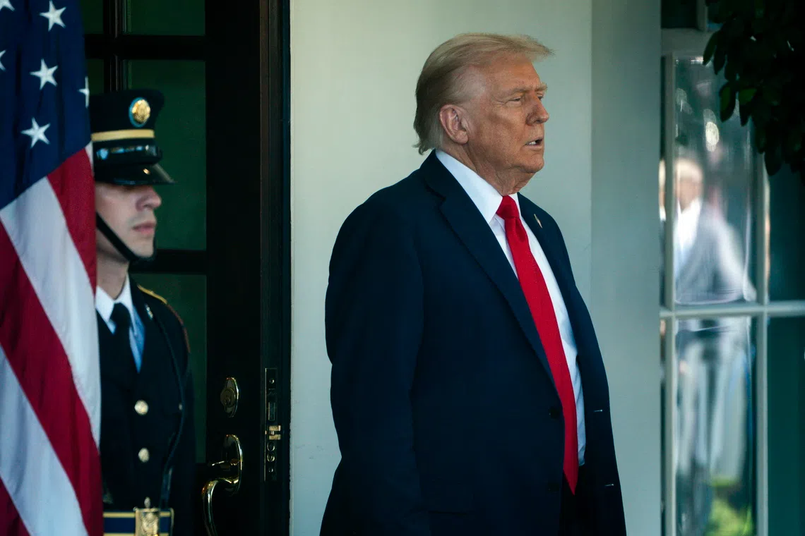 epa12442900 US President Donald Trump waits to welcome President of Finland Alexander Stubb (not pictured) at the White House in Washington, DC USA, 09 October 2025. EPA/WILL OLIVER