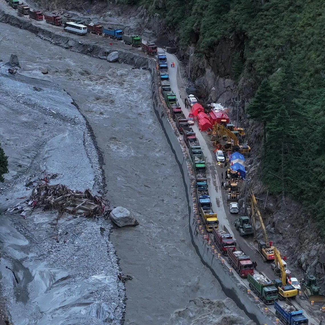 Excavators and rescue equipment at the core disaster-hit area at Gyirong Port following the Aug 26 mudslide, in Tibet, China.