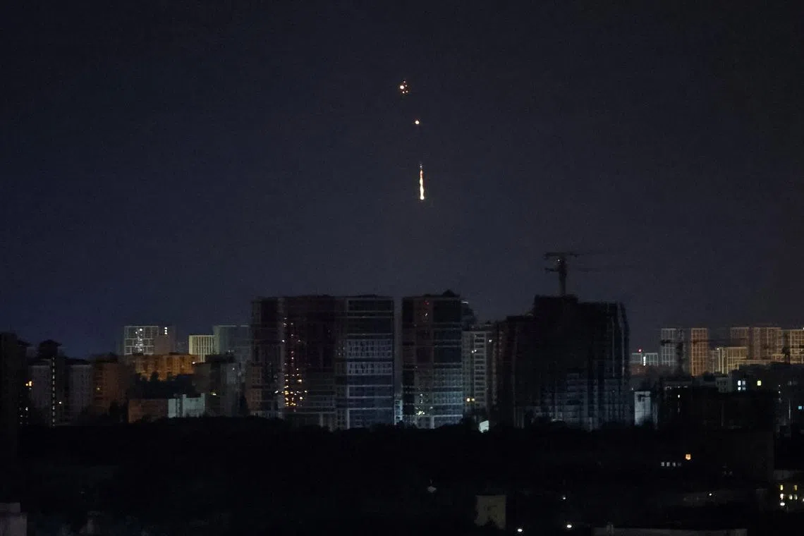 An explosion of a drone is seen in the sky over the city during a Russian drone strike, amid Russia's attack on Ukraine, in Kyiv, Ukraine July 31, 2024. REUTERS/Gleb Garanich
