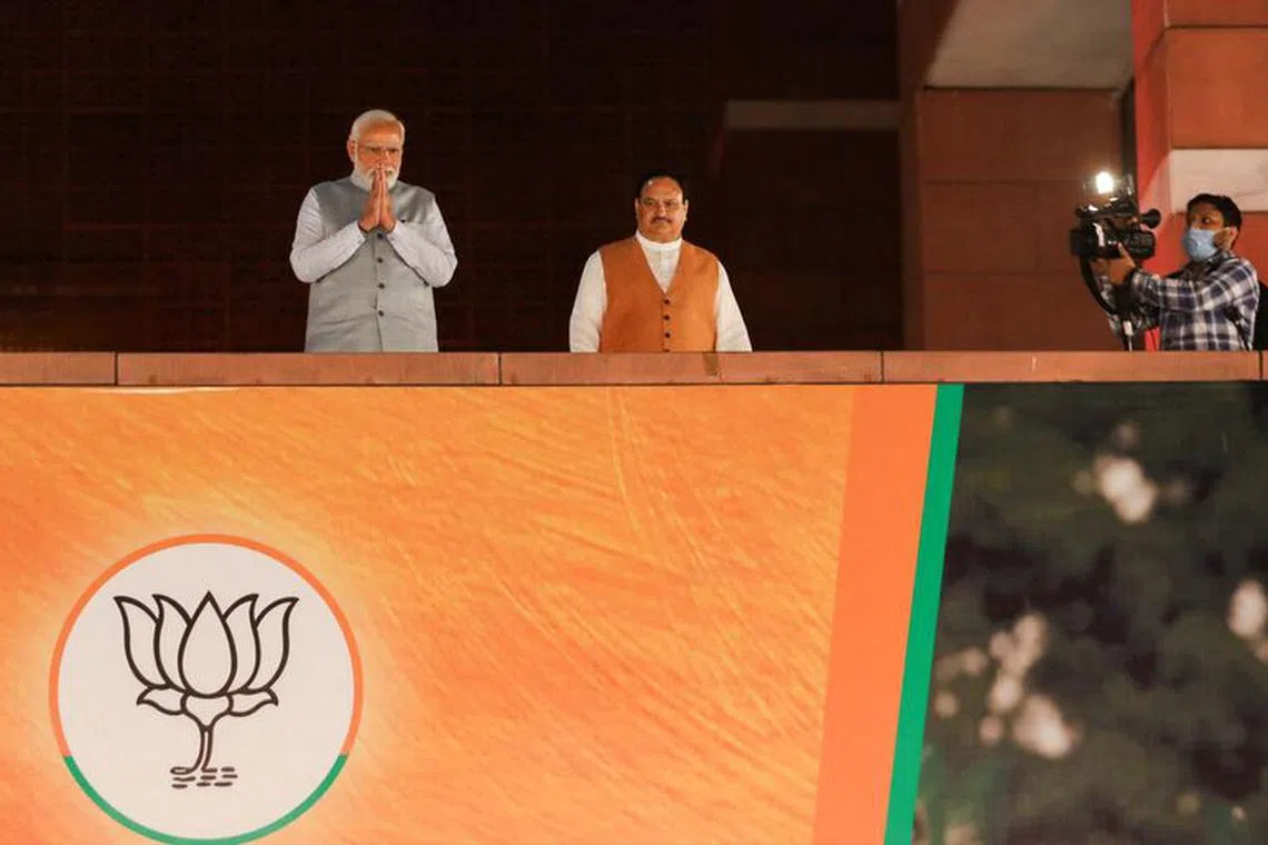 India's Prime Minister Narendra Modi gestures as he addresses the crowd after his party won the state assembly elections in the Uttar Pradesh state, at the Bharatiya Janata Party's (BJP) headquarter, in New Delhi, India, March 10, 2022. REUTERS/Anushree Fadnavis/File Photo
