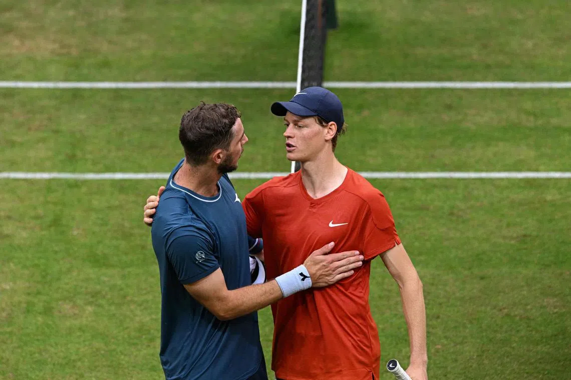 Struff (left) unleashed 18 aces and saved 16 of 18 break points, but still went down 6-2, 6-7 (1/7), 7-6 (7/3) to world number one Sinner.