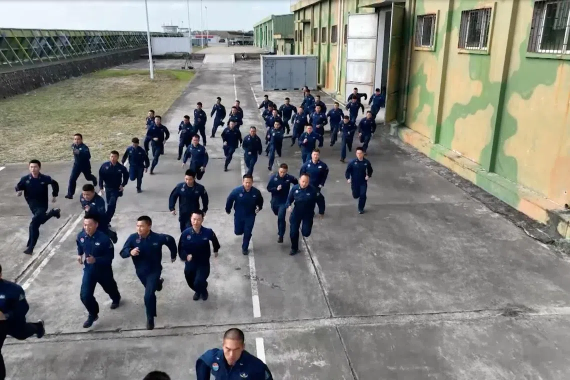 Members of the Chinese People's Liberation Army (PLA) take part in the \"Joint Sword-2024B\" military drills around Taiwan, from an undisclosed location in this screenshot from a handout video released by the PLA Eastern Theatre Command on October 14, 2024. PLA Eastern Theatre Command/Handout via REUTERS