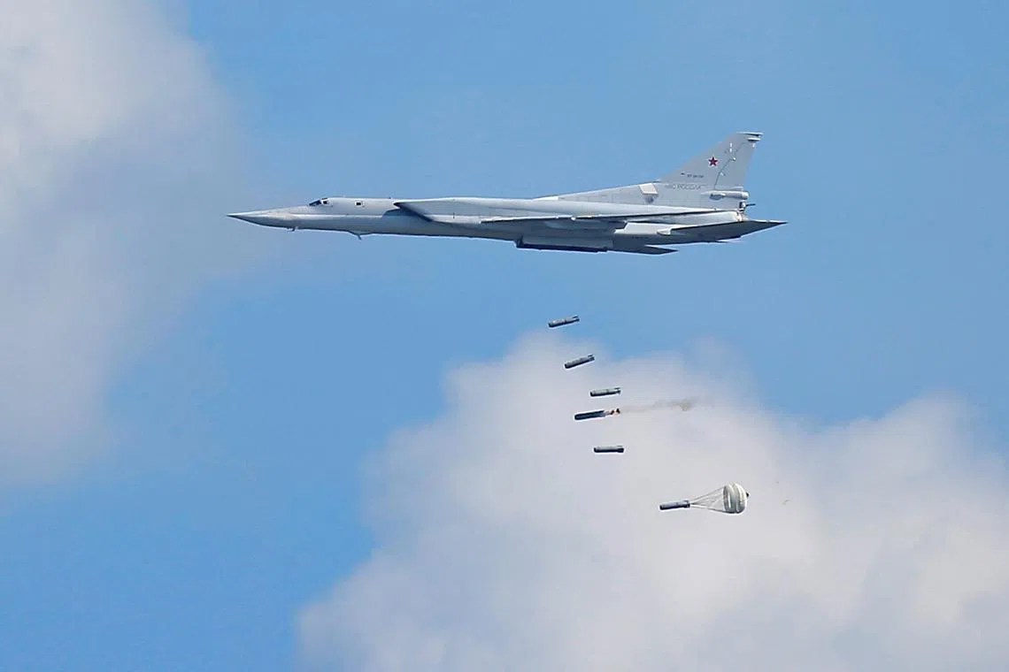 FILE PHOTO: A Tupolev Tu-22M3 bomber performs during the International Army Games 2016, in Dubrovichi outside Ryazan, Russia, August 5, 2016. REUTERS/Maxim Shemetov/File Photo