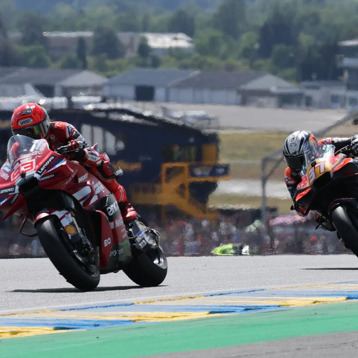 MotoGP - French Grand Prix - Bugatti Circuit, Le Mans, France  - May 9, 2026 Ducati Lenovo Team's Marc Marquez and Red Bull KTM Factory Racing's Pedro Acosta in action during the sprint race REUTERS/Stephane Mahe