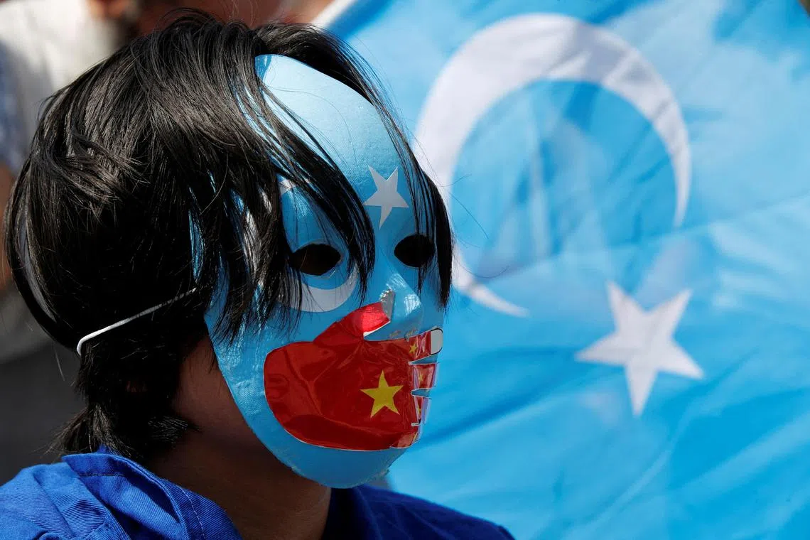 Ethnic Uyghur demonstrators taking part in a protest against the visit of Chinese Foreign Minister Wang Yi to the Turkish capital, near the Chinese consulate in Istanbul, Turkey on July 26, 2023. 