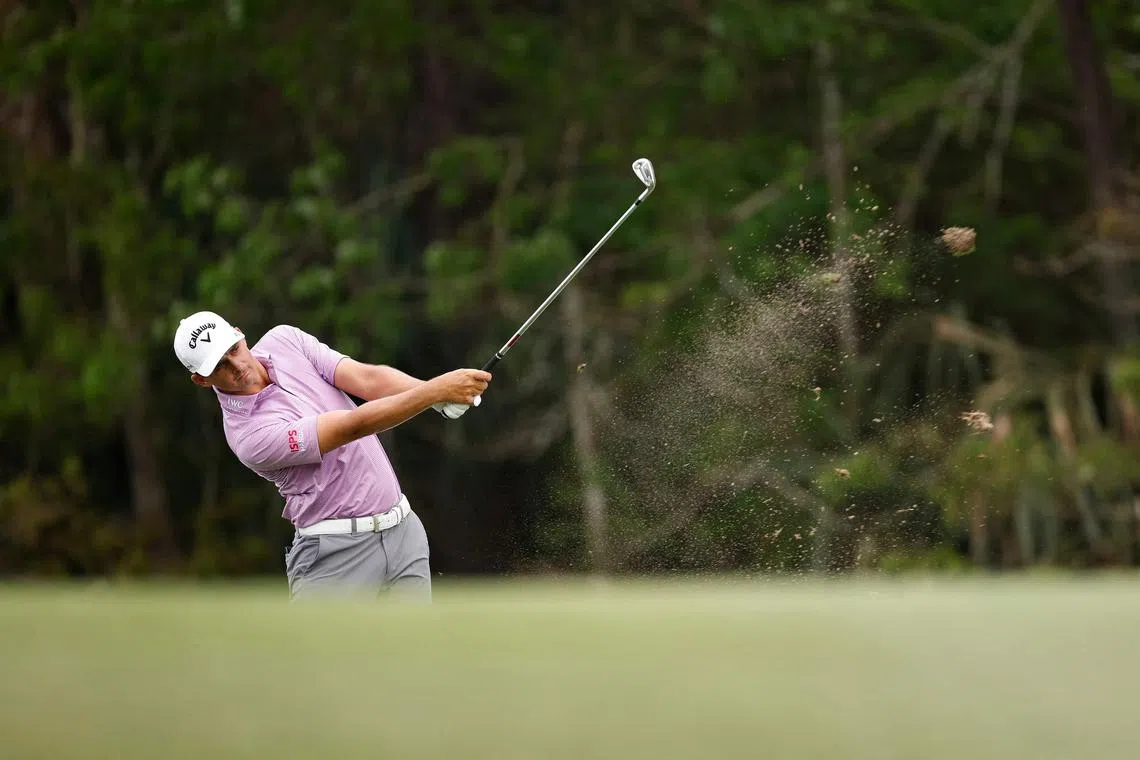 Christiaan Bezuidenhout of South Africa plays an approach shot on the 14th hole during the second round of the Players Championship.