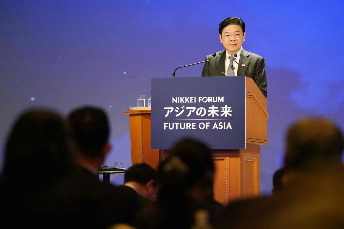 Deputy Prime Minister of Singapore Lawrence Wong delivers a speech at the Nikkei Forum "28th Future of Asia" in Tokyo.