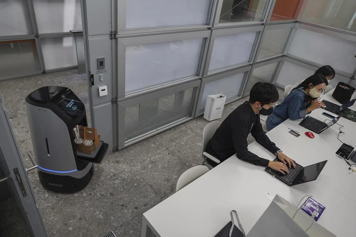 A robot making a coffee delivery at the offices of Naver, on the outskirts of Seoul, on Sept 28, 2022.