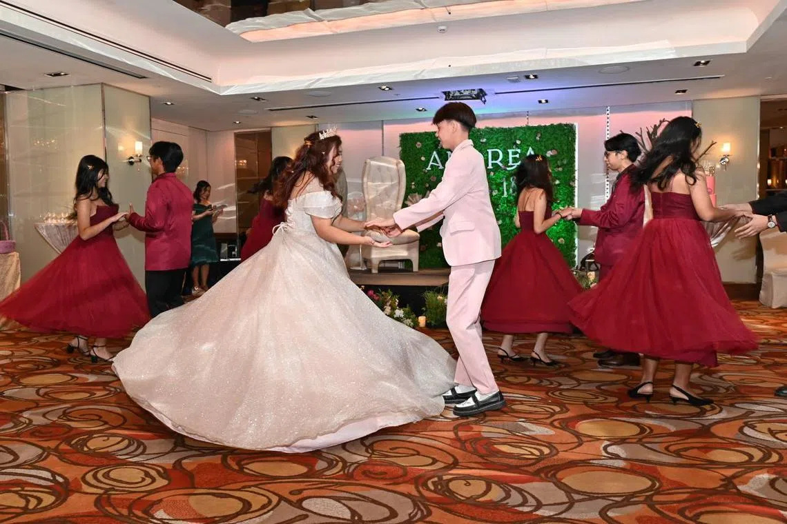 Temasek Polytechnic student Andrea Din’s debut was themed after an enchanted garden. During the event, she danced and sang with her friends. In Filipino culture, this big coming-of-age bash for girls is known as a debut (pronounced the BOO). It is a joyous gathering that is often planned and celebrated by the birthday girl’s family and friends.