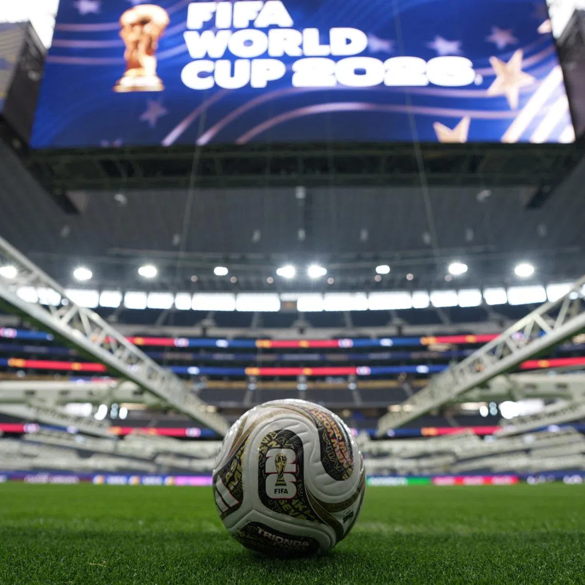 The new adidas Trionda Final ball, the official match ball for the semi-finals, the third-place play-off and final of the 2026 FIFA World Cup, on the pitch at Dallas Stadium, Arlington, Texas, U.S., July 12, 2026.  REUTERS/Leonardo Benassatto