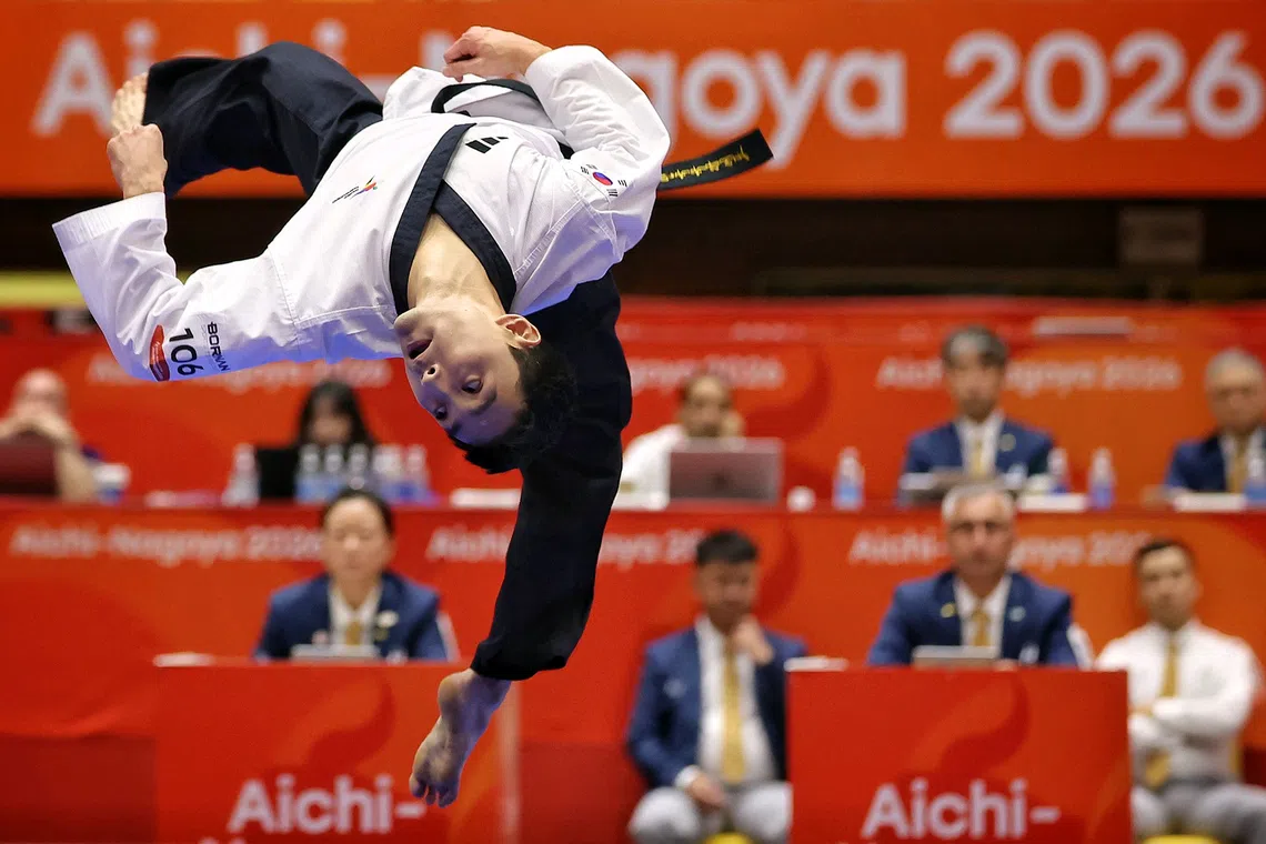 (FOR SPORTS FEATURE, PLEASE DO NOT SHARE) Yun Kyu-sung of South Korea executing his routine in the Aichi-Nagoya 2026 Asian Games men individual poomsae gold medal contest at Toyohashi Gymnasium in Aichi, Japan on Oct 1, 2026. ST PHOTO: KEVIN LIM stpixgames05 stpixgames05-ol