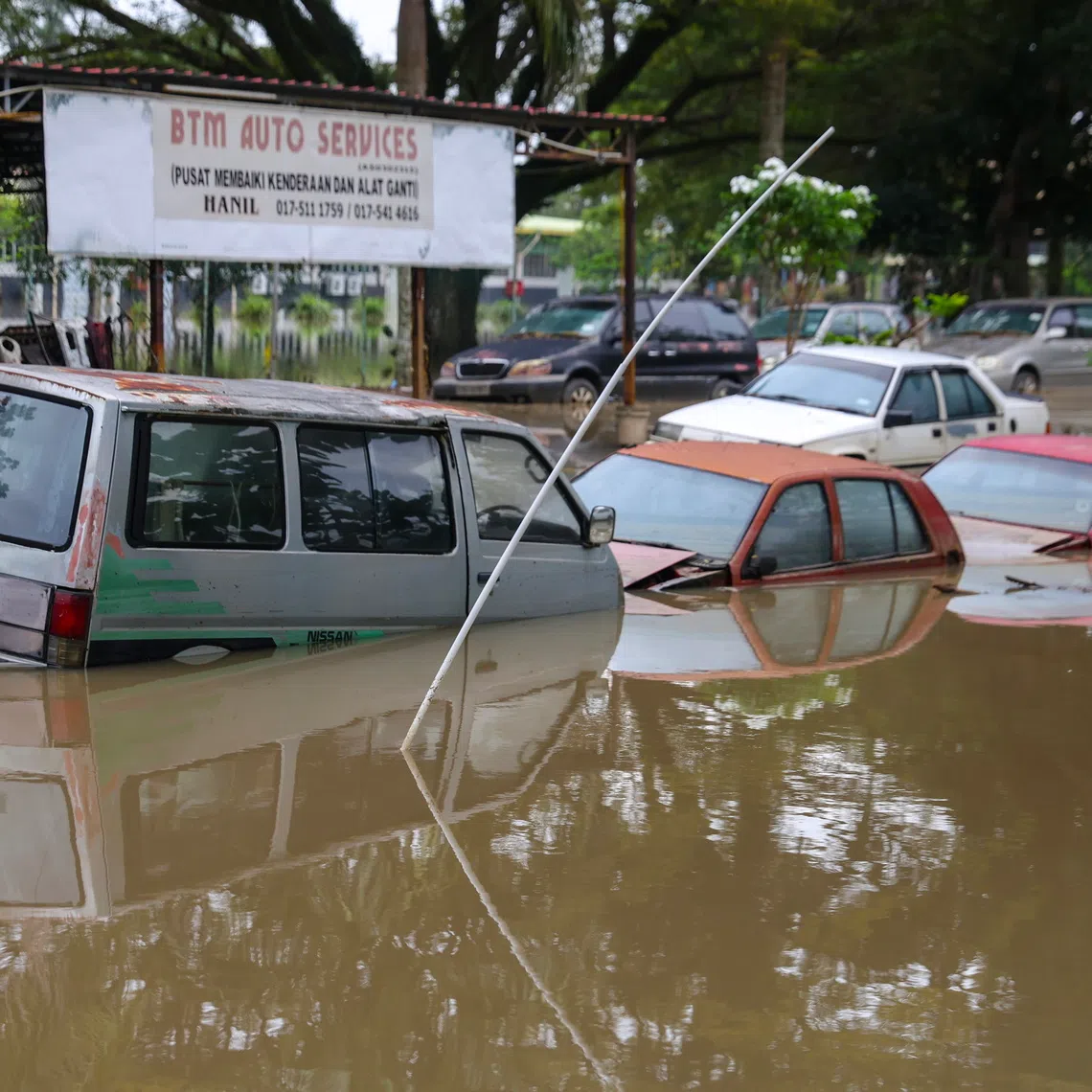 Cars submerged by floodwaters at the town of Kangar, state of Perlis, Malaysia, 28 November 2025. The rare tropical storm ‘Senyar’ was expected to bring persistent heavy rain and strong winds to the west coast of Peninsular Malaysia, raising the risk of several days of adverse weather. EPA/FAZRY ISMAIL