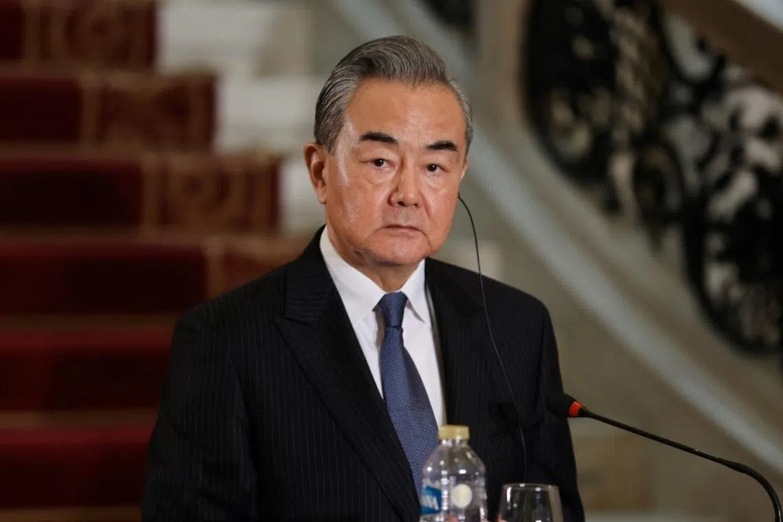 FILE PHOTO: Chinese Foreign Minister Wang Yi holds a press conference, in Cairo, Egypt January 14, 2024. REUTERS/Mohamed Abd El Ghany/File Photo