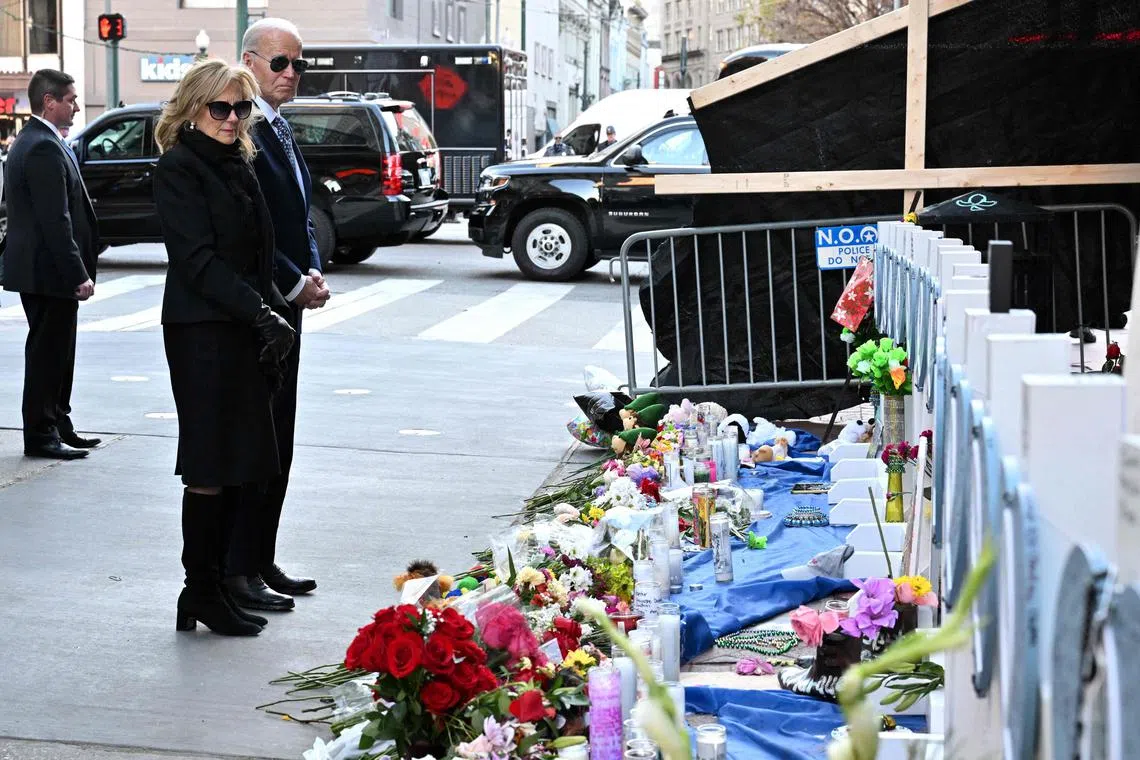 US President Joe Biden and First Lady Jill Biden pay their respects to victims of the Jan 1 truck attack at a makeshift memorial in Bourbon Street in New Orleans, on Jan 6.