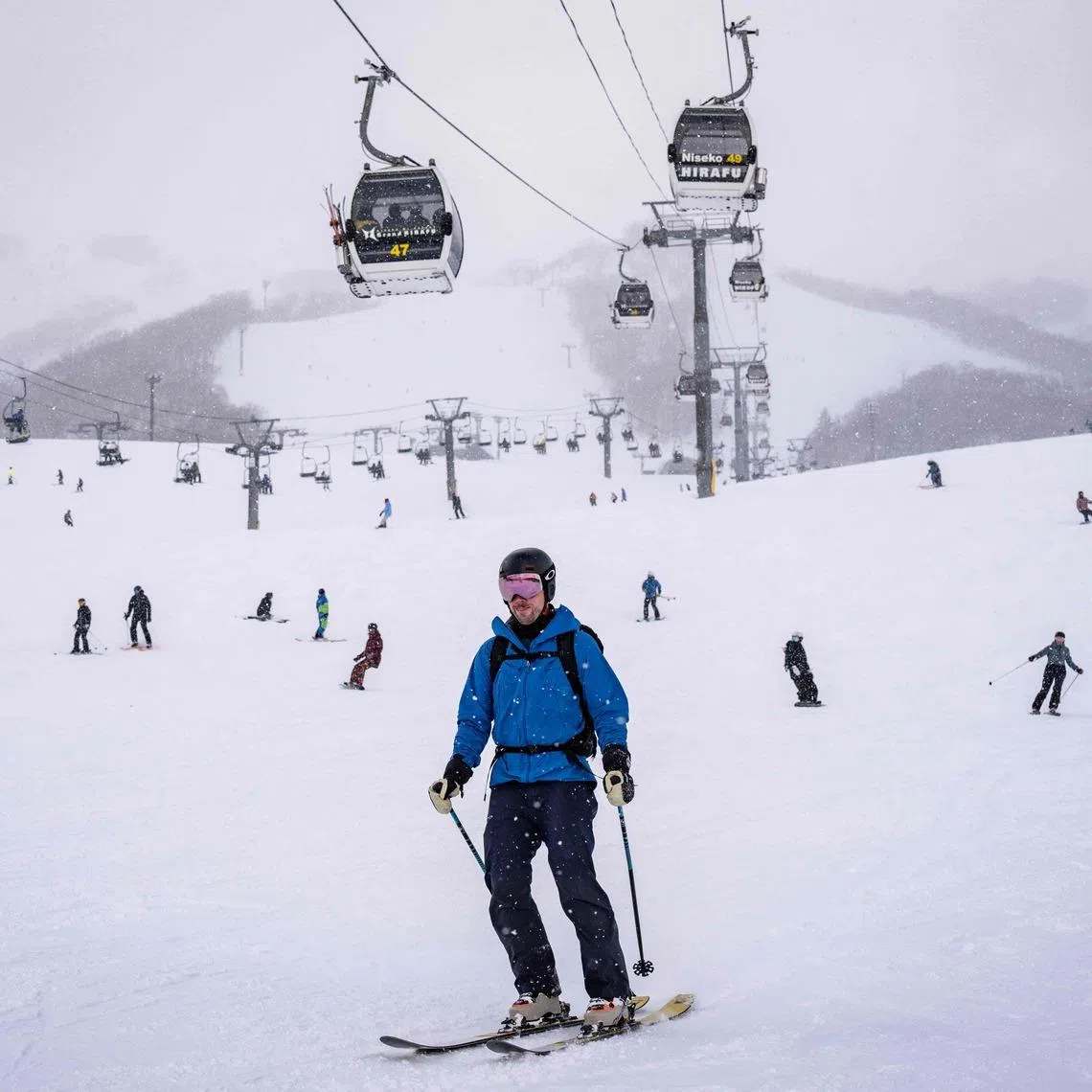 Tourists skiing and snowboarding at the Niseko Tokyu Grand Hirafu ski resort in Kutchan, Hokkaido prefecture on Feb 19, 2026.