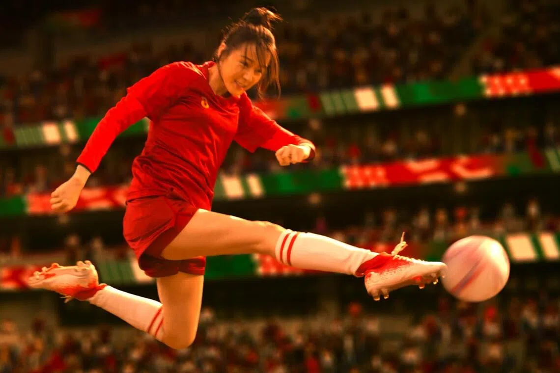 Striker Yulong (played by Dilraba Dilmurat) in a movie scene from Kung Fu Soccer.
