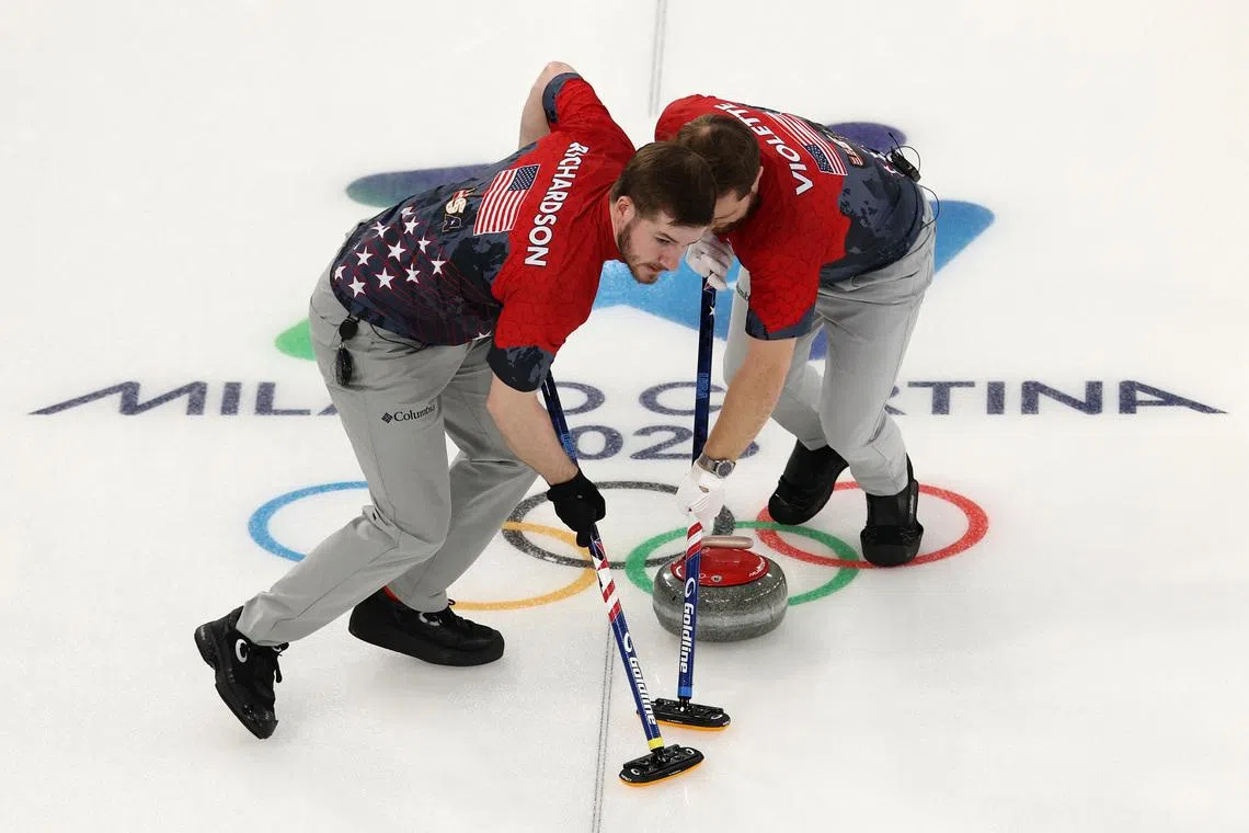 Curling-Britain trounce US to keep playoff hopes alive