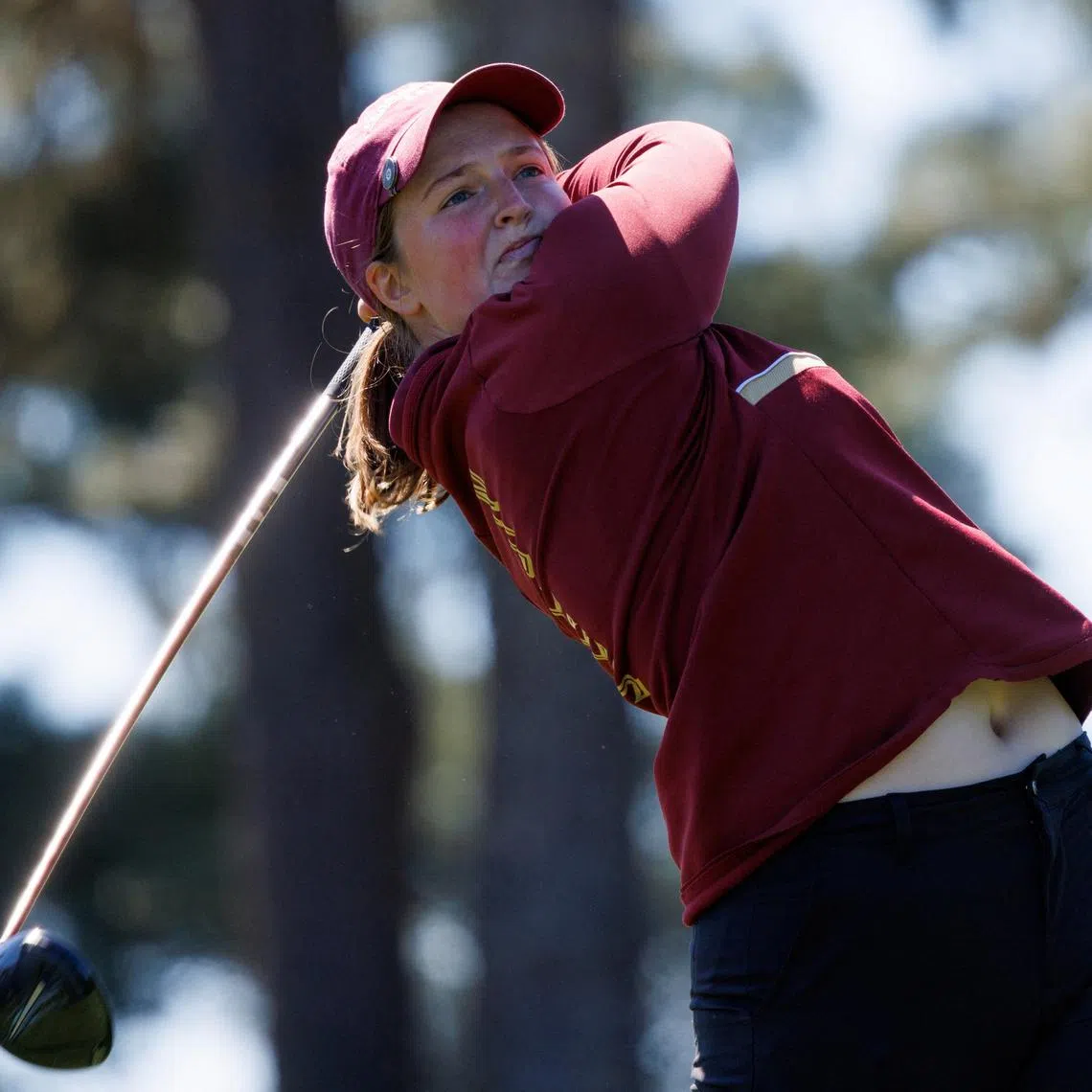 FILE PHOTO: Golf - Augusta National Women's Amateur - Augusta National Golf Club, Augusta, Georgia, United States - April 6, 2024  England's Lottie Woad hits off the third tee during the final round  REUTERS/Mike Blake/ File Photo