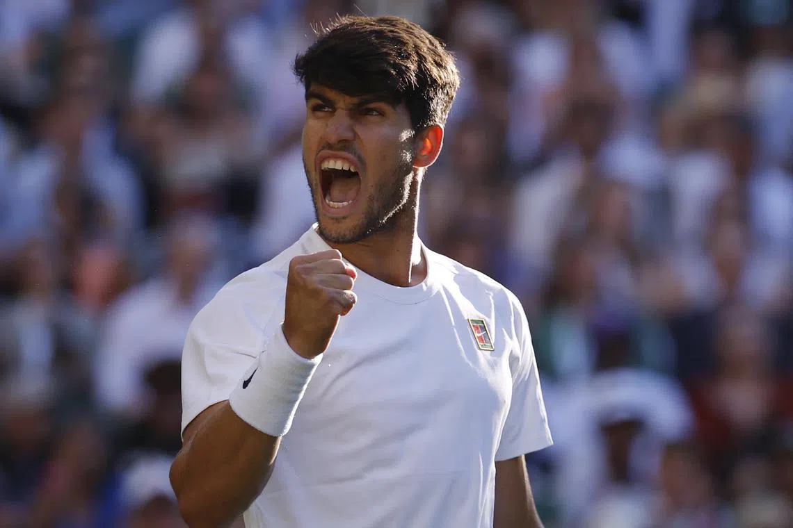 Tennis - Wimbledon - All England Lawn Tennis and Croquet Club, London, Britain - July 8, 2025 Spain's Carlos Alcaraz celebrates after winning his quarter final match against Britain's Cameron Norrie REUTERS/Andrew Couldridge