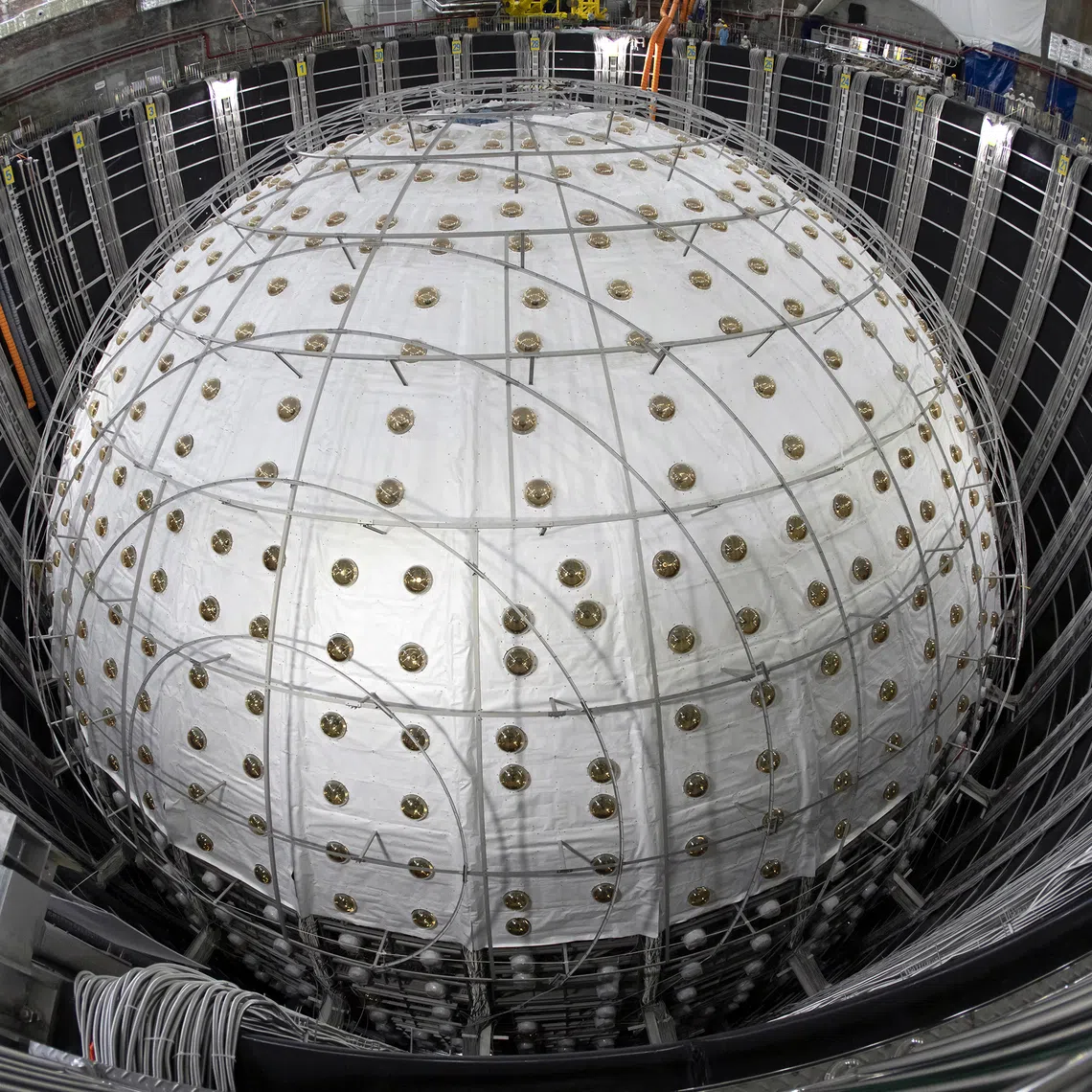 The Jiangmen Underground Neutrino Observatory consists of a giant sphere to detect the elusive neutrino particle.