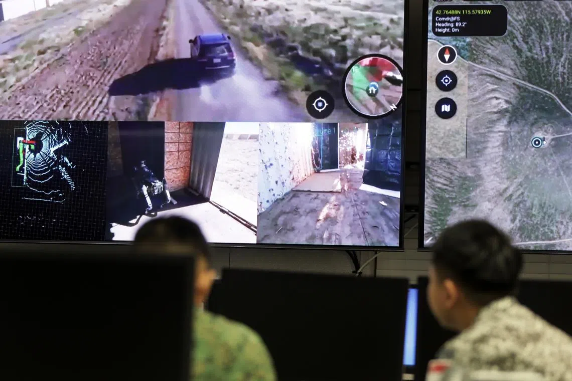 A screen in the integrated command post at Exercise Forging Sabre showing live feeds from drones and a robot dog, which help the decision-making process of commanders.