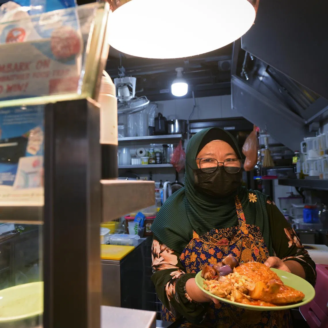 Ms Surayah Omar, who runs Meal Logi at Bukit Canberra Hawker Centre, uses the lower-sodium K-salt both for the food she sells, and at home.