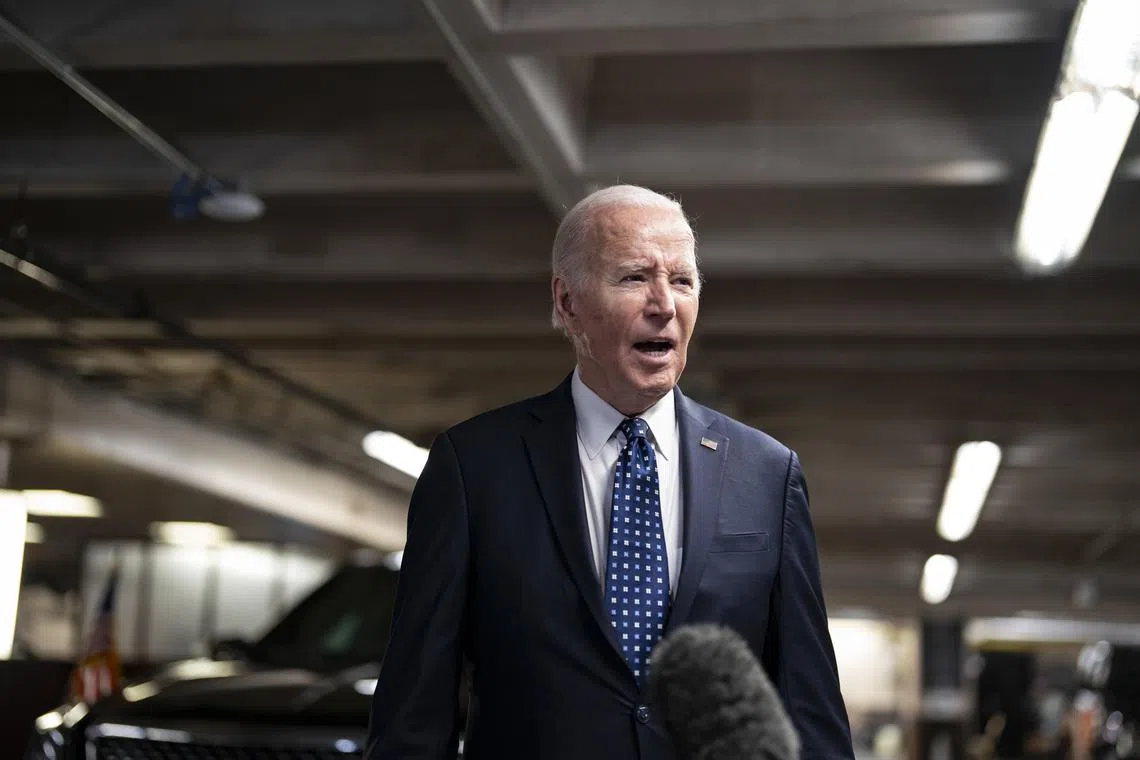 President Joe Biden speaks to reporters after a private meeting with Yulia and Dasha Navalnaya, the wife and daughter of the late Russian dissident leader Alexei Navalny, in the parking garage of the Fairmont San Francisco.