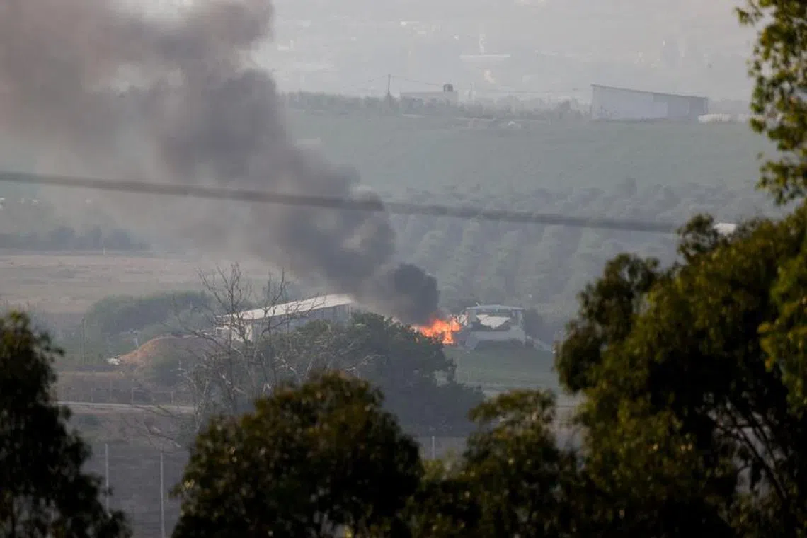 Smoke rises over Gaza, as seen from Israel's border with Gaza, in southern Israel October 28, 2023. REUTERS/Amir Cohen