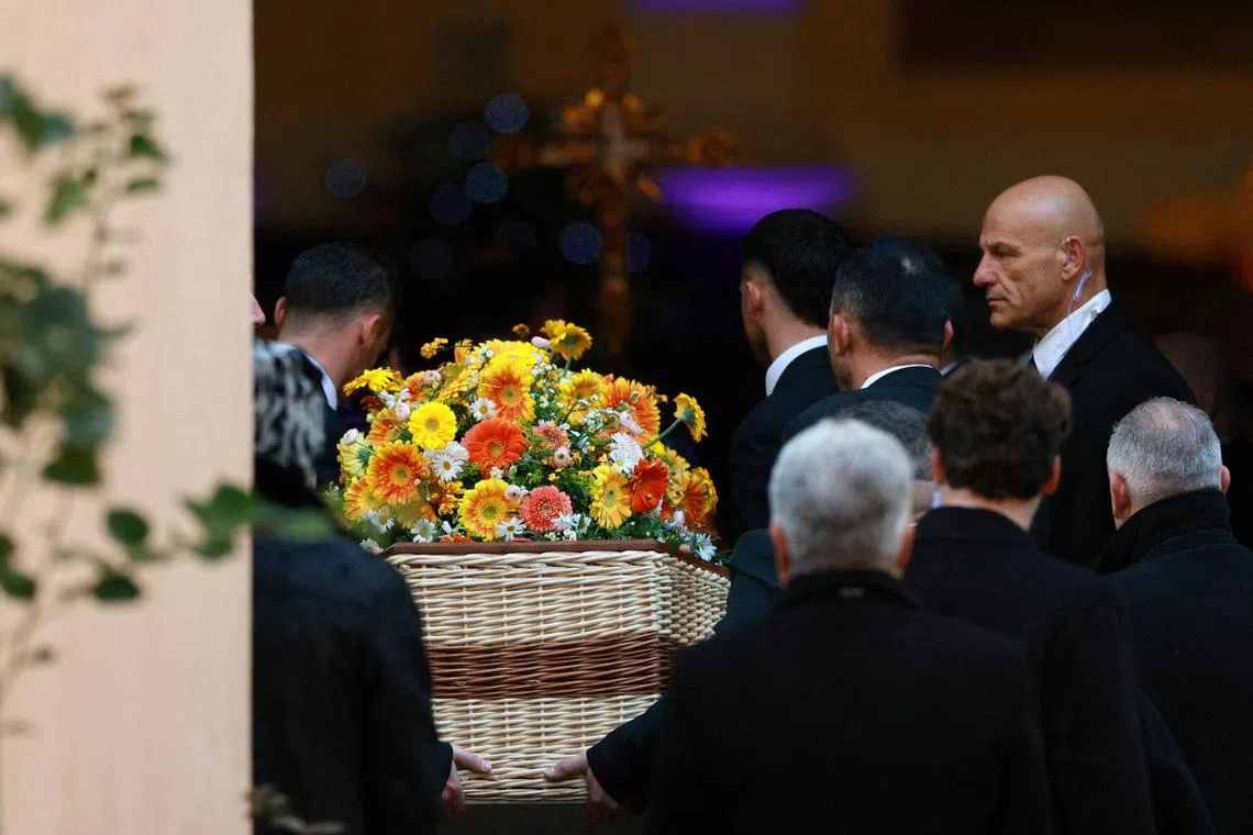 Pallbearers carry the coffin of the late French film icon Brigitte Bardot at they arrive at the funeral ceremony at the Notre-Dame-de-l’Assomption church in Saint-Tropez, France, January 7, 2026. REUTERS/Manon Cruz