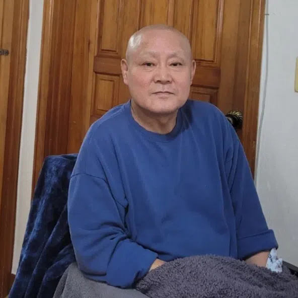 Wheelchair-bound Lee Myung-shik has endured constant discomfort since his 2020 diagnosis with acute myelitis.