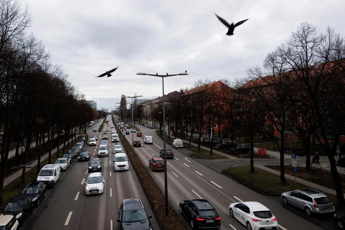 FILE PHOTO: Cars drive on the Mittlerer Ring after the driving ban for vehicles with Euro 5 diesel engines came into force in Munich, Germany, February 1, 2023. REUTERS/Lukas Barth/File Photo