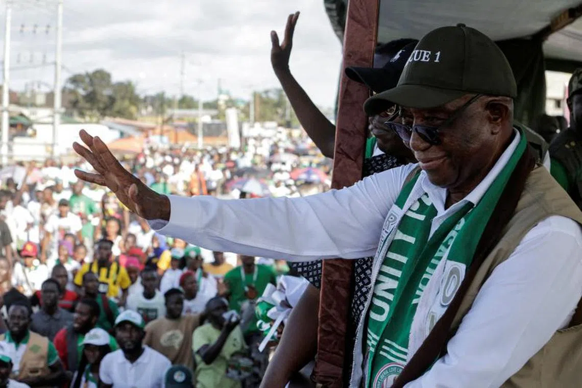 FILE PHOTO: Liberia's opposition Unity Party Joseph Boakai waves to his supporters as holds his final campaign rally for the presidential elections in Monrovia, Liberia October  7, 2023. Reuters/Carielle Doe