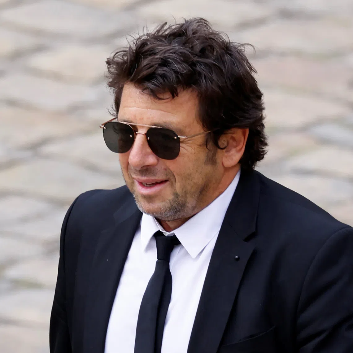 Patrick Bruel arrives to attend a national tribute for late actor Jean-Paul Belmondo during a ceremony at the Hotel des Invalides in Paris, France, September 9, 2021. REUTERS/Eric Gaillard