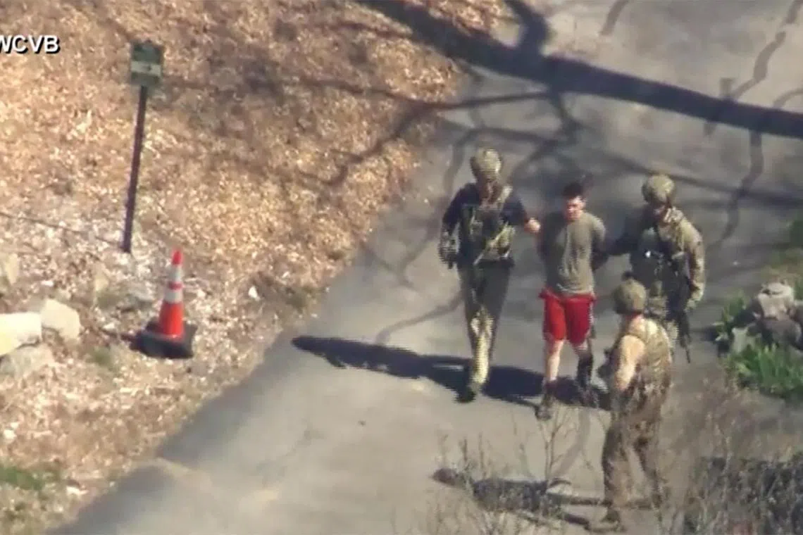 FBI agents arrest Jack Teixeira in connection with an investigation into the leaks online of classified US documents.