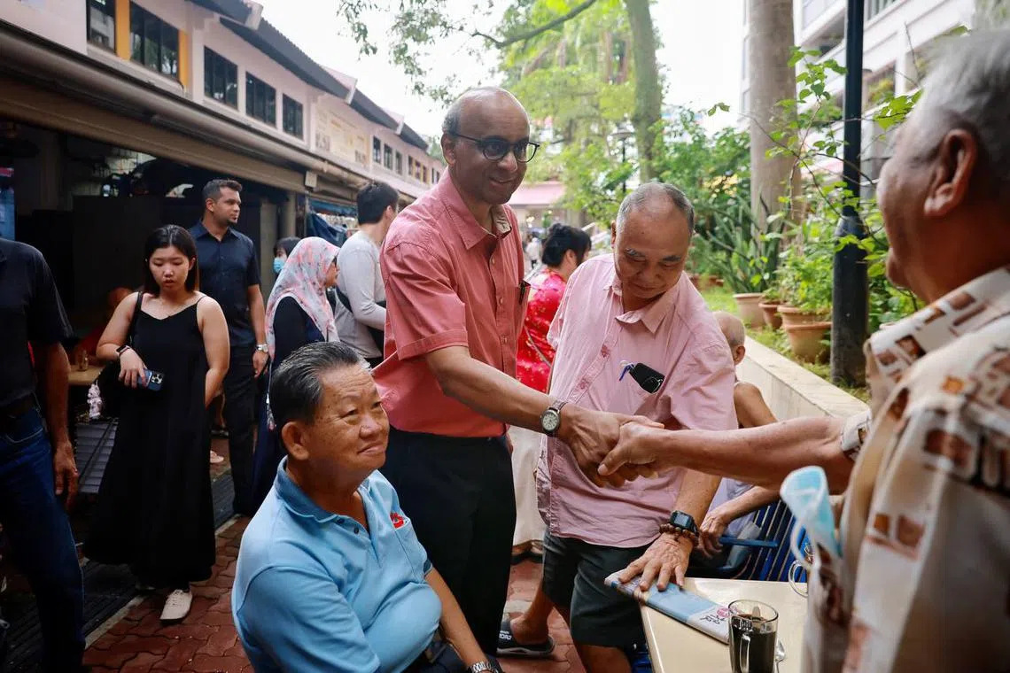 Former Senior Minister and presidential hopeful Tharman Shanmugaratnam on a walkabout in Teck Whye to meet residents. 