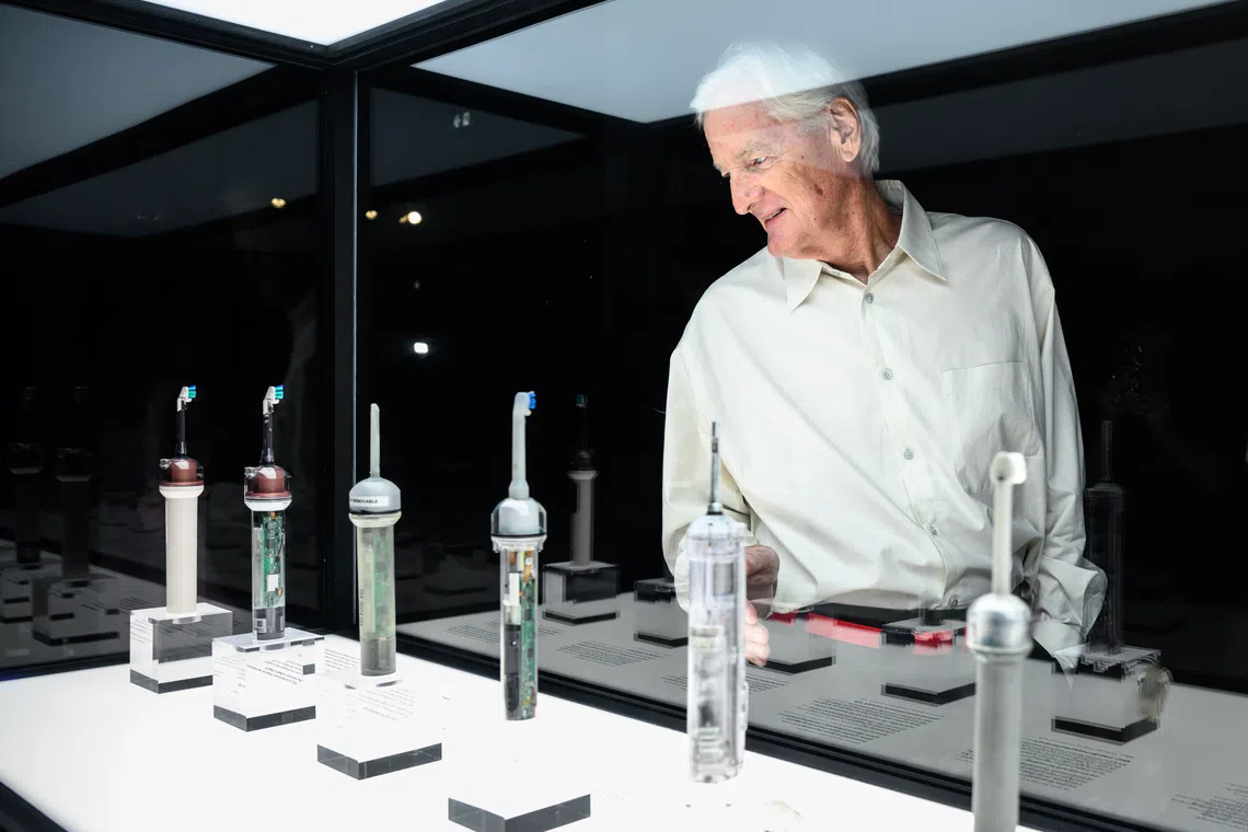 Dyson founder James Dyson unveiling the new Dyson CameraJet toothbrush in Paris on Sept 1.