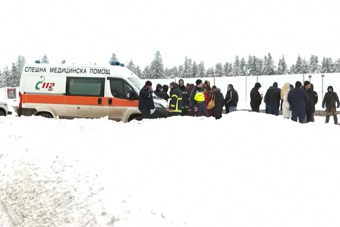 Emergency services work near Petrohan mountain, the scene where people were found dead, near the village of Gintsi, Bulgaria, February 2026, in this screen grab taken from a video. NOVA TV/Handout via REUTERS