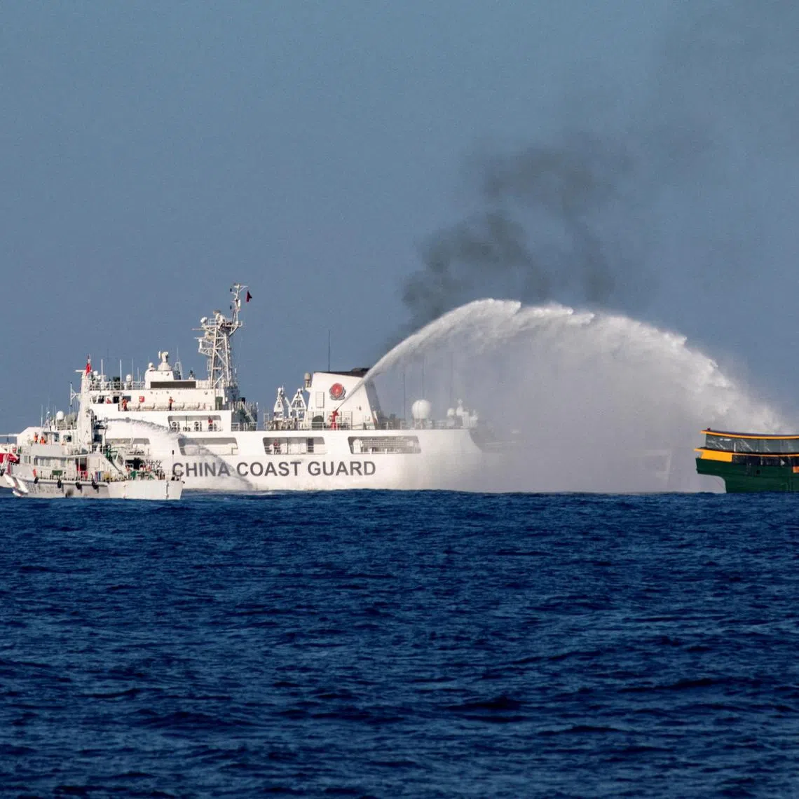 Chinese Coast Guard vessels fire water cannons towards a Philippine resupply vessel Unaizah May 4 on its way to a resupply mission at Second Thomas Shoal in the South China Sea.