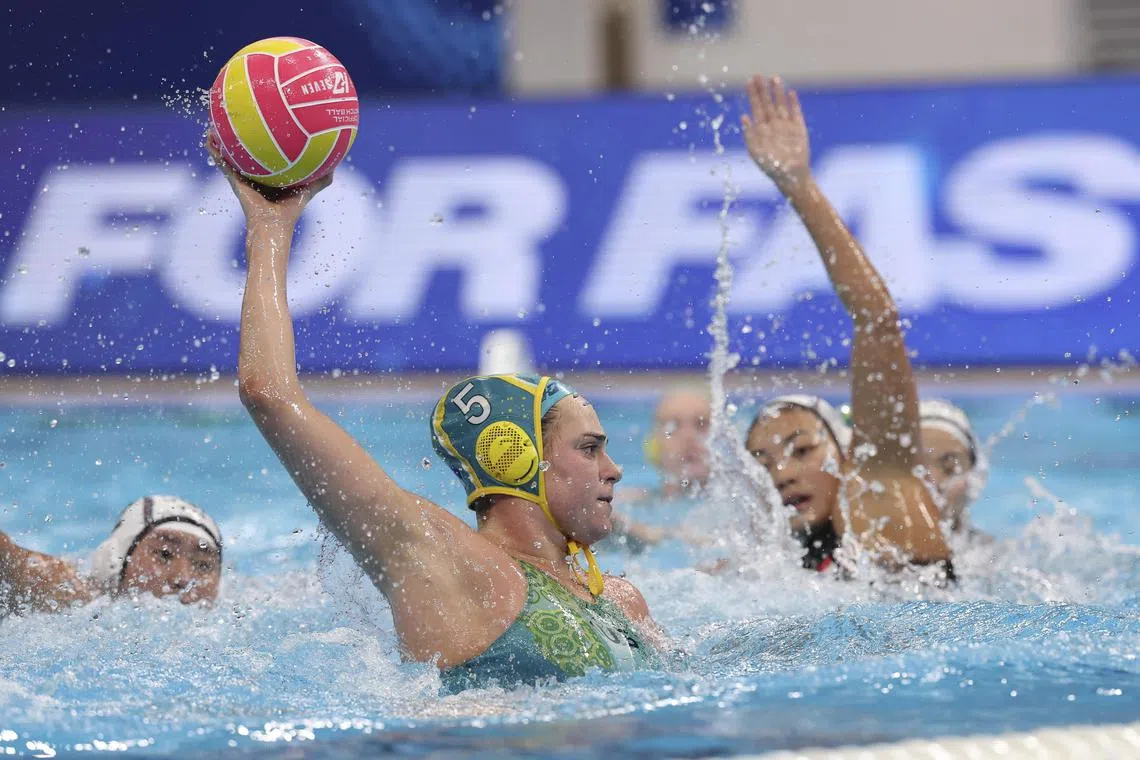 Sienna Green of Australia in action during the water polo match between Australia  and Singapore at the World Aquatics Championships in Singapore.