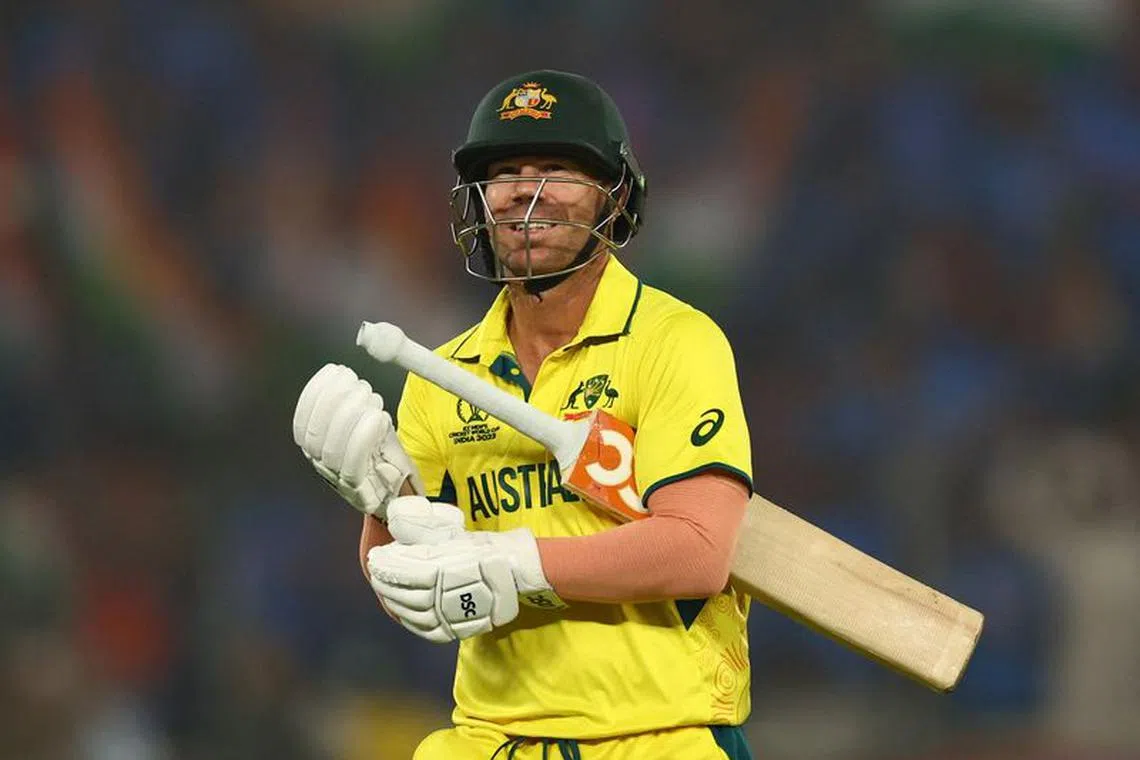 Cricket - ICC Cricket World Cup 2023 - Final - India v Australia - Narendra Modi Stadium, Ahmedabad, India - November 19, 2023 Australia's David Warner walks after losing his wicket, caught out by India's Virat Kohli off the bowling of Mohammed Shami REUTERS/Andrew Boyers