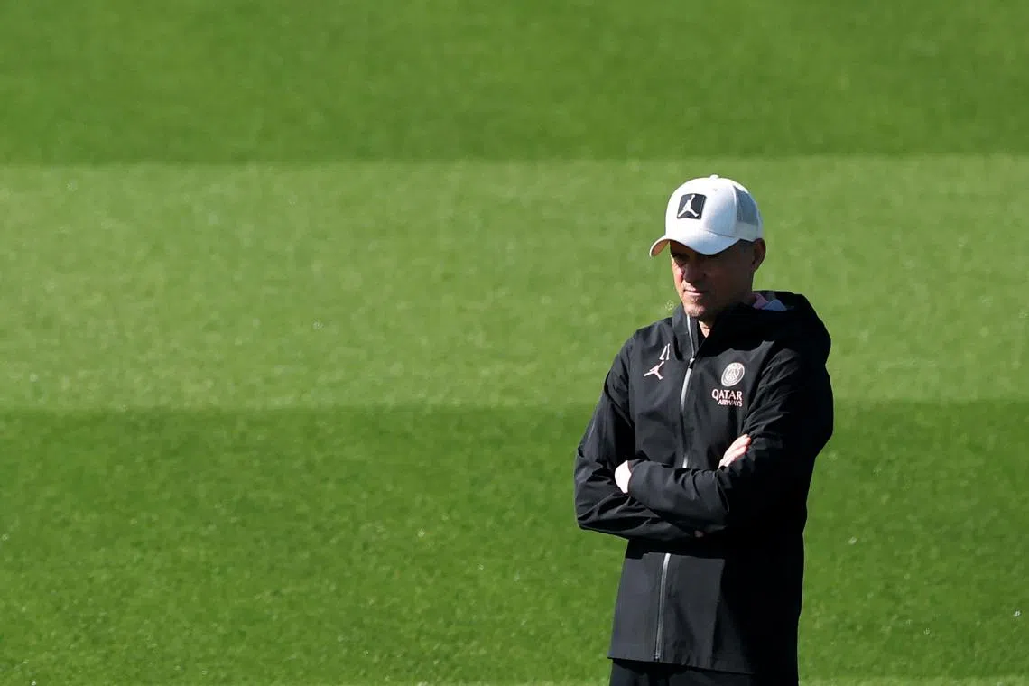 Soccer Football - Champions League - Paris St Germain Training - Paris St Germain Training Centre, Poissy, France - April 8, 2025 Paris St Germain coach Luis Enrique during training REUTERS/Christian Hartmann