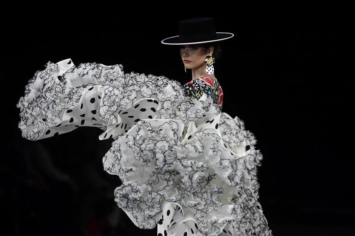 A model presents a creation by Con T D'Touche during the Simof 2023 (International Flamenco Fashion Show) in Sevilla on Jan 29, 2023. 