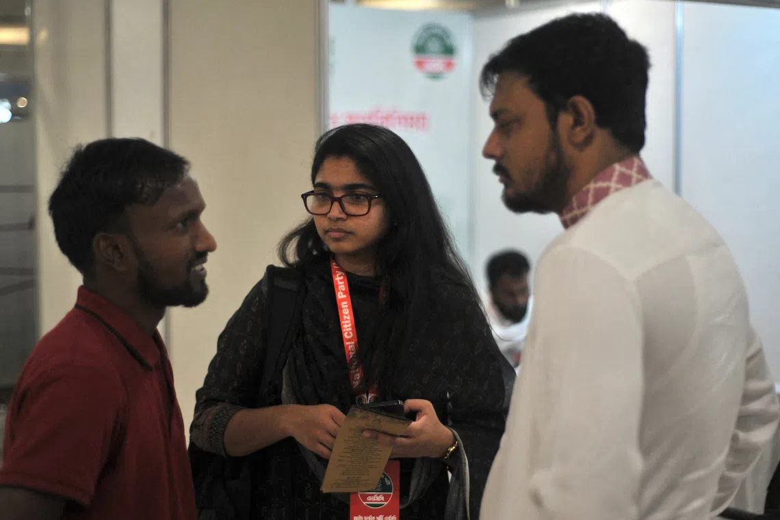FILE PHOTO: National Citizen Party (NCP) senior leaders Tasnim Jara and Nasiruddin Patowari speak with Shujon Khan, a rickshaw puller who wants to run for MP in the country's upcoming national election, at the party's candidate interviewing event in Dhaka, Bangladesh, November 24, 2025. REUTERS/Sam Jahan/File Photo