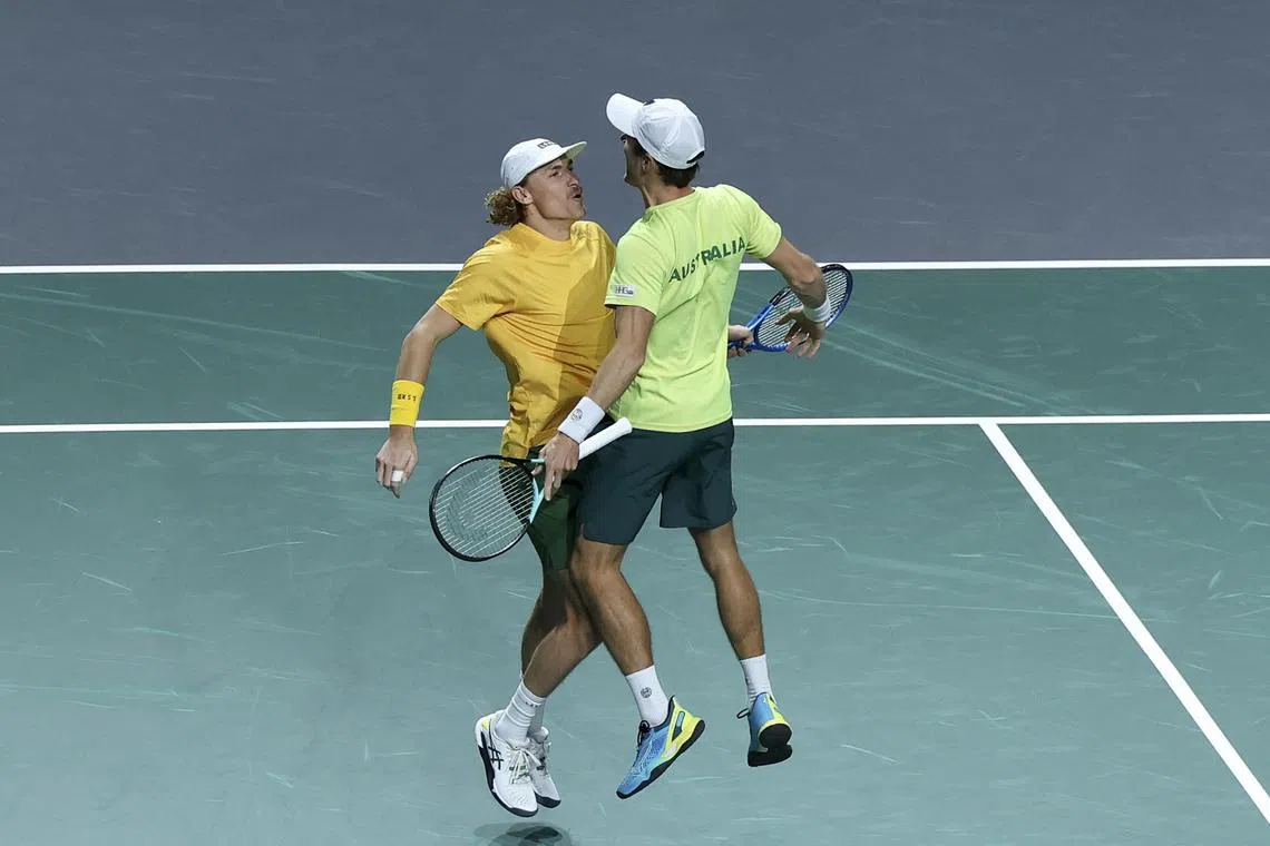 Matthew Ebden (right) and Max Purcell of Australia celebraing at the end of the 2023 Davis Cup Final 8 quarterfinals between Czech Republic and Australia in Malaga, Spain.