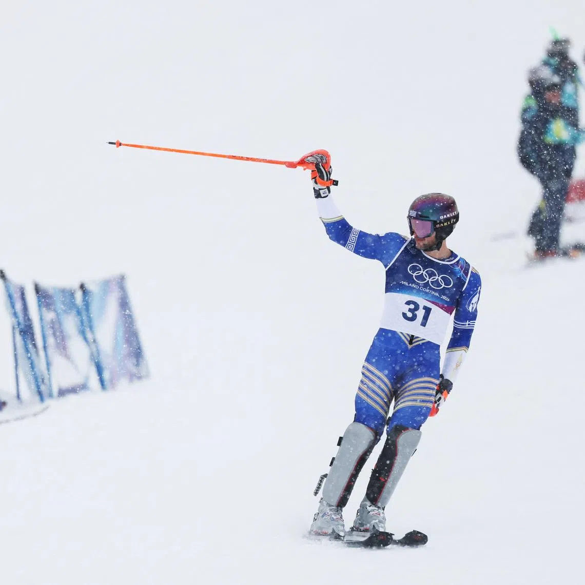 Milano Cortina 2026 Olympics - Alpine Skiing - Men's Slalom Run 1 - Stelvio Ski Centre, Bormio, Italy - February 16, 2026. Aj Ginnis of Greece reacts at the end of his first run in the Men's Slalom REUTERS/Gintare Karpaviciute