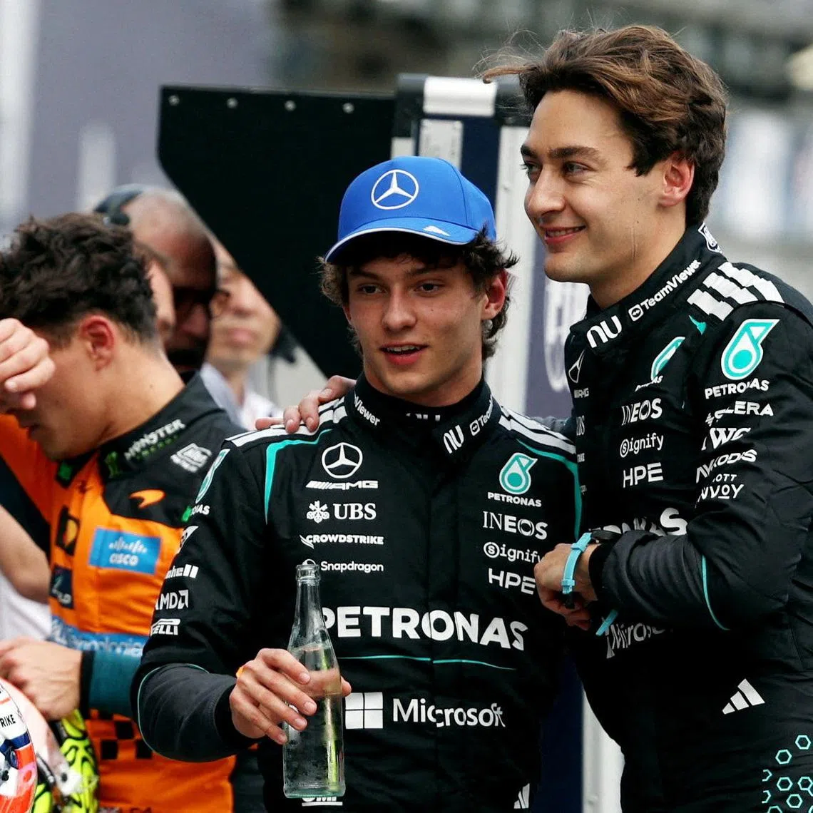Formula One F1 - Australian Grand Prix - Albert Park Grand Prix Circuit, Melbourne, Australia - March 7, 2026 Mercedes' George Russell celebrates after qualifying in pole position with second place Mercedes' Andrea Kimi Antonelli REUTERS/Hollie Adams